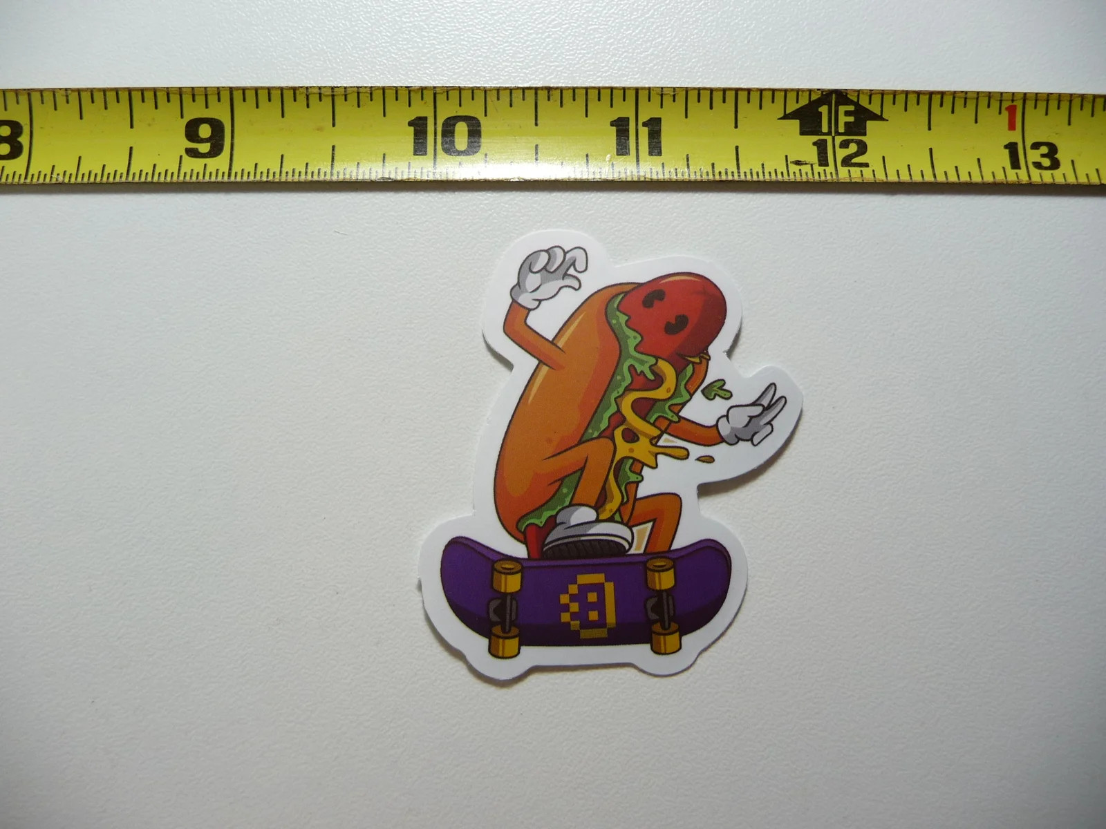 COOL HOTDOG RIDING SKATEBOARD SMALL STICKER DECAL FRANKFURTER