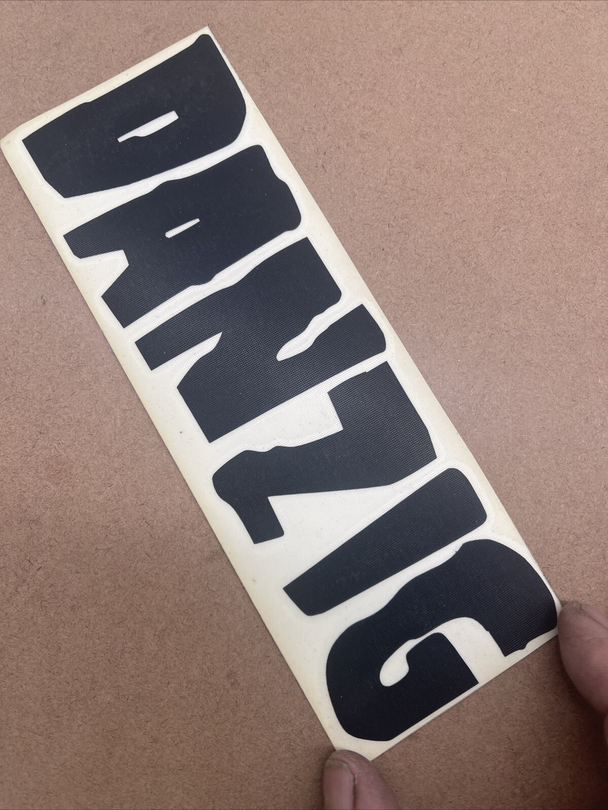 Danzig Black Vinyl Decal: 7 1/2” X 2 1/2”, Nor For Porous Surfaces, Peel Off