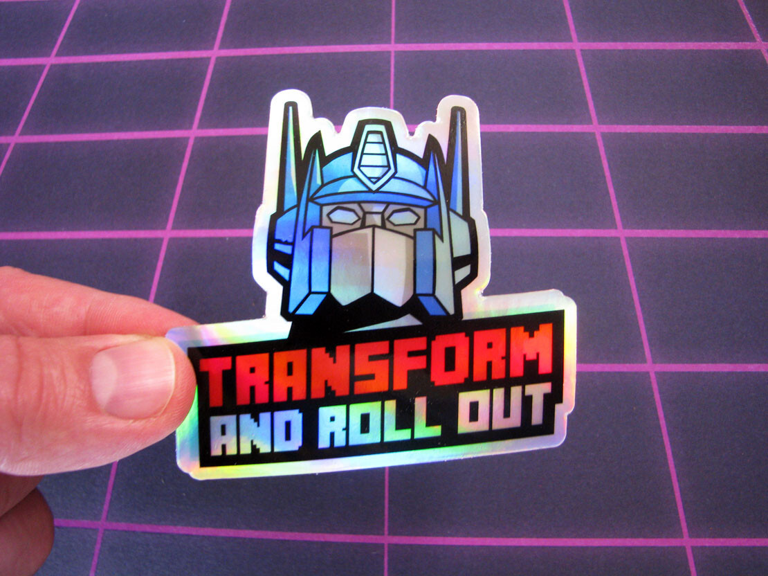«Roll Out» Holographic Sticker Metallic Robot Laptop Skateboard Decal