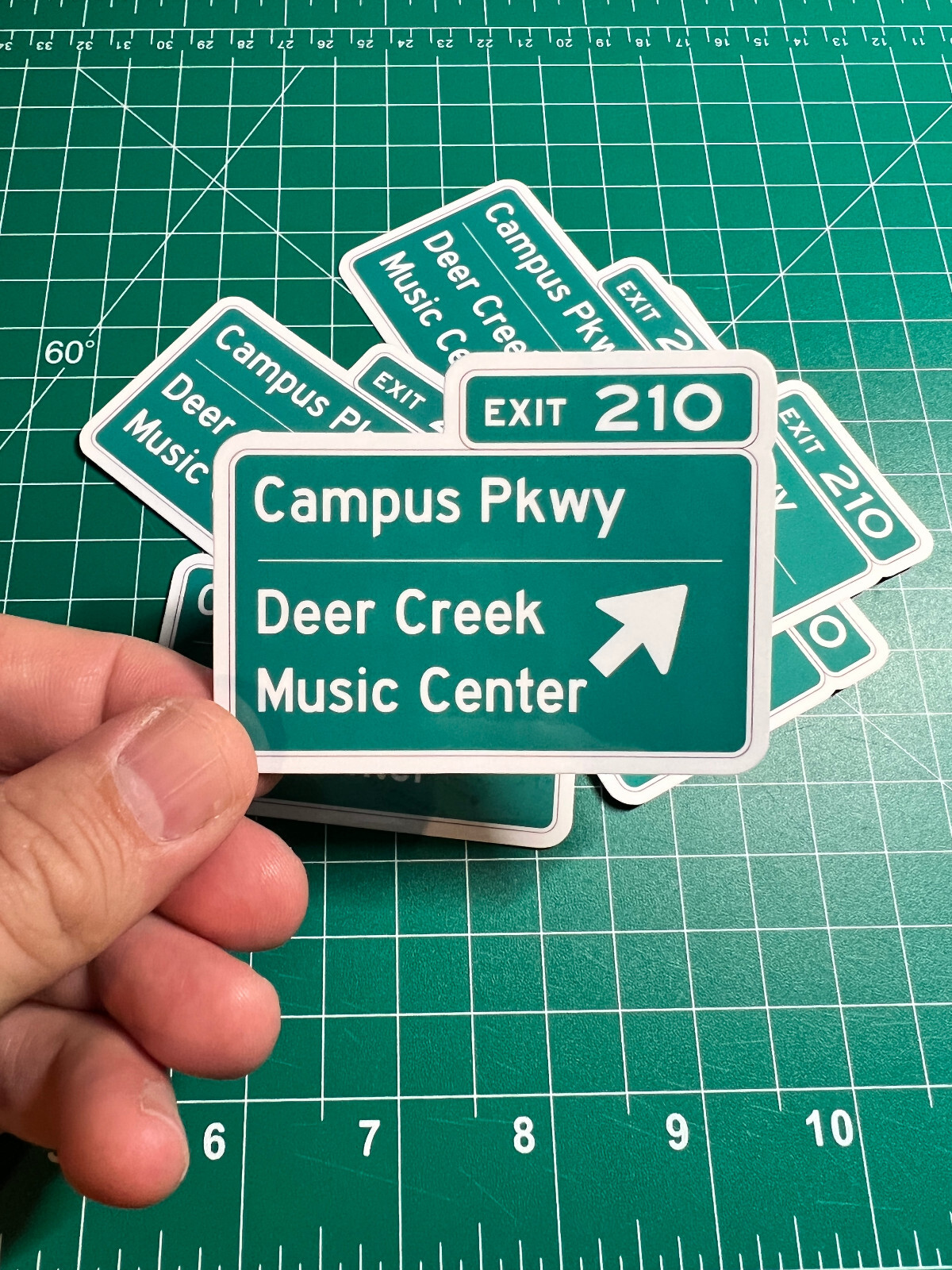 Deer Creek Music Center Road Sign – Laminated Vinyl Sticker – 2.5″x3″
