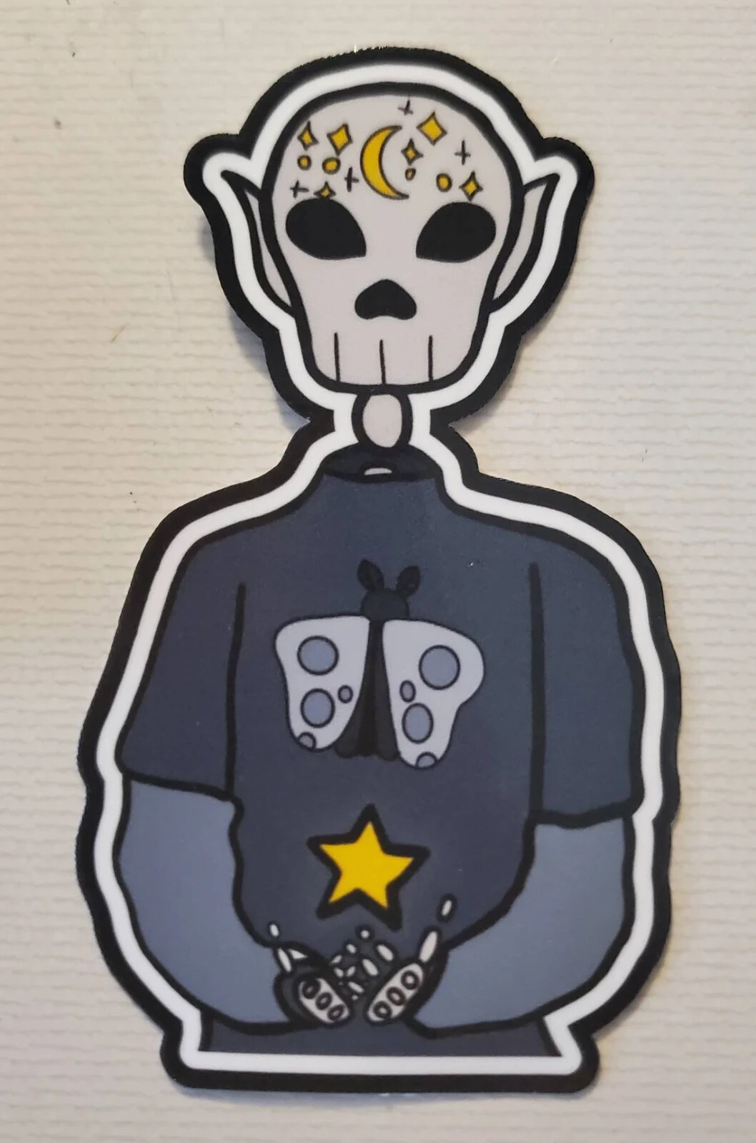 Handmade «Skeleton in Moth Shirt» die cut sticker. See description!