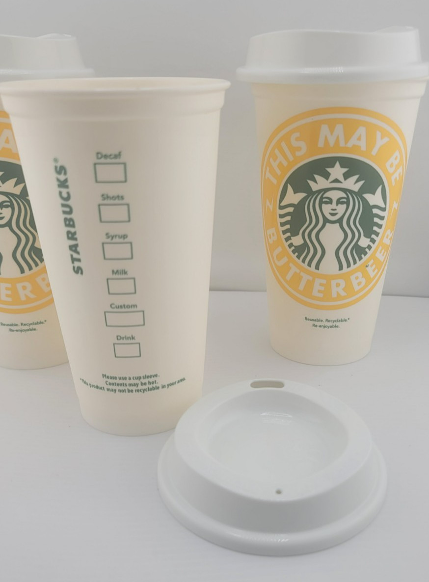 Starbucks Reusable Coffee Cup in Yellow – This May Be Butterbeer with Lid