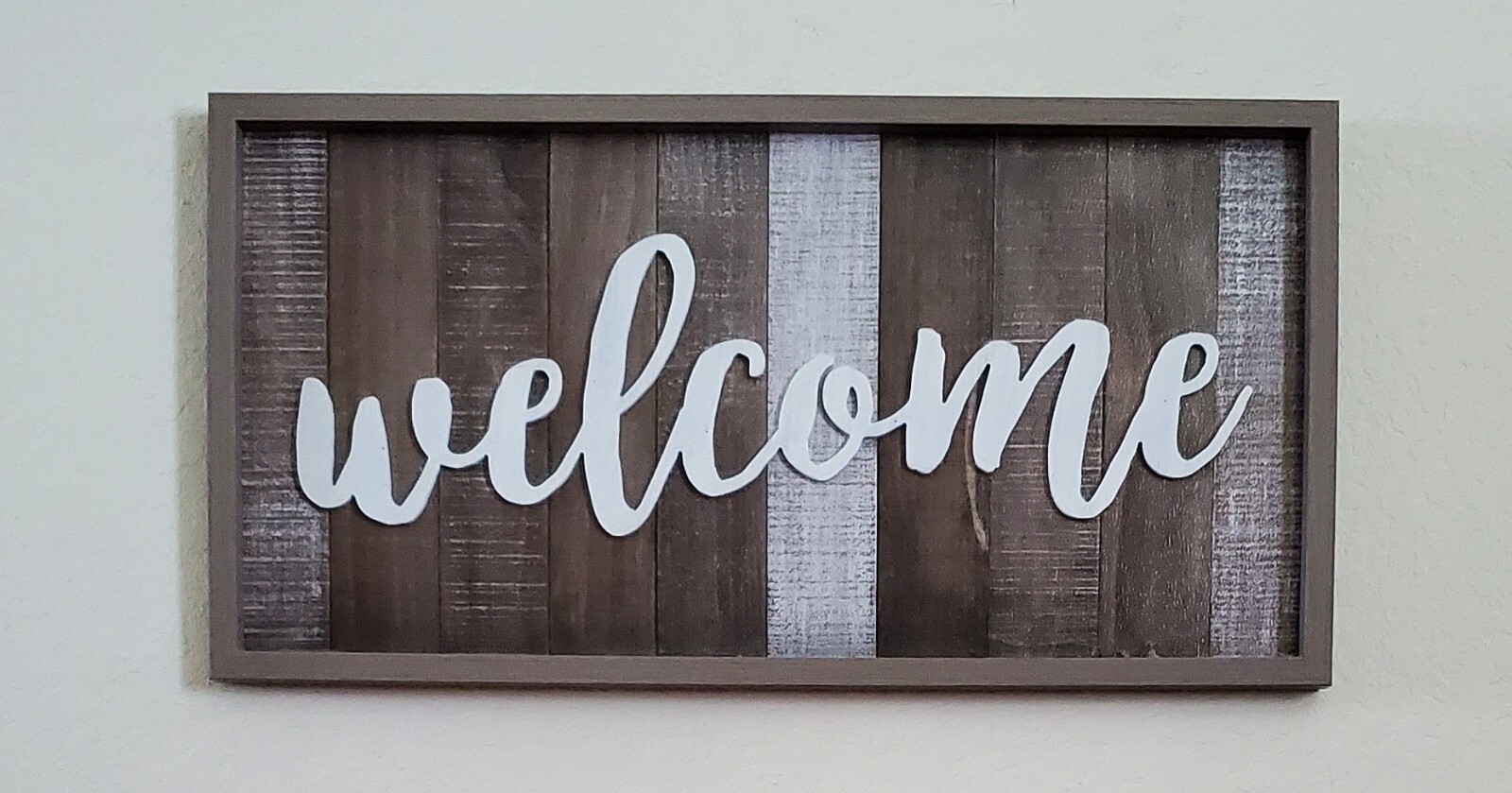 Decorative Wall Art. Deep brown wood color striped with white accents.